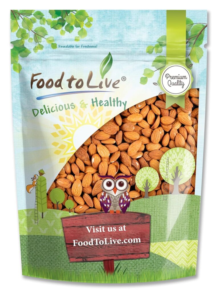 This image is of a bag of Almonds. The Brand is Food to Live, organic, non GMO. THere is a window into the bag showing the almonds. A green banner across the bottom of the bag, a wooden sign with an owl sitting on it. 