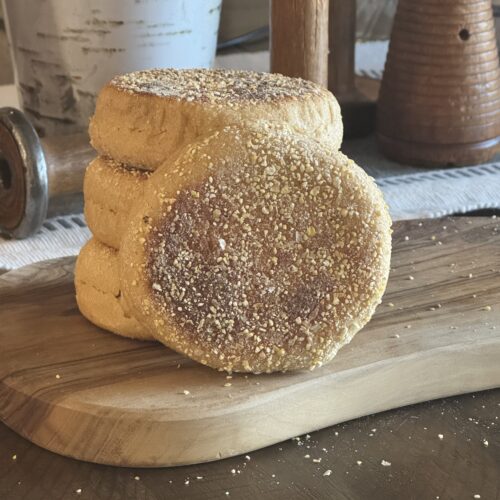 a stack of food on a wooden board