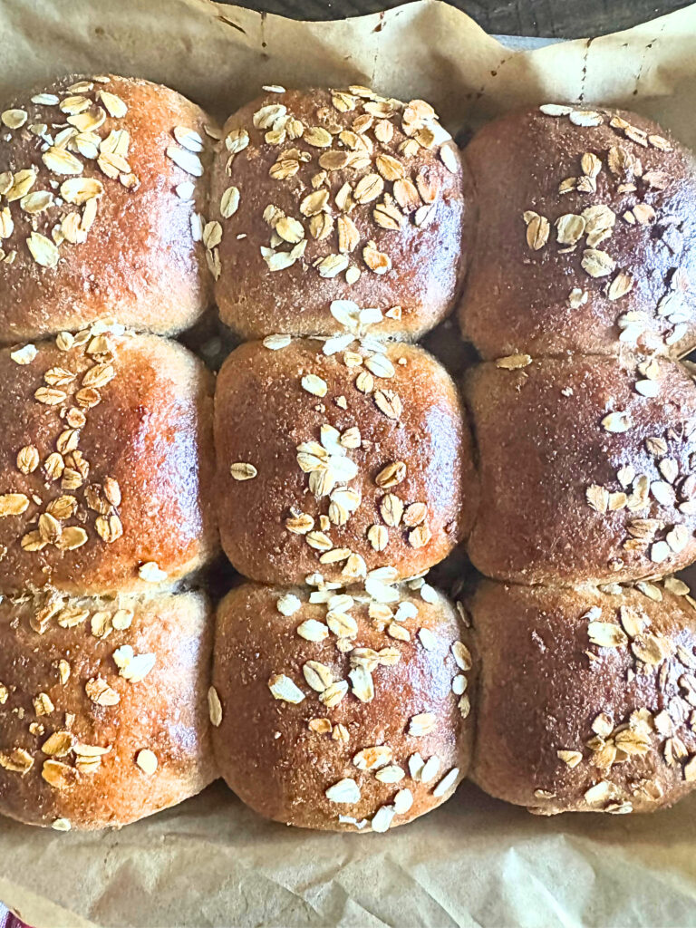Honey oat wheat bread dinner rolls baked golden brown