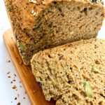 no-knead spelt bread on a cutting baord